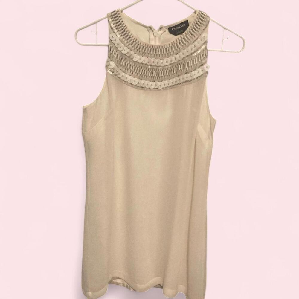 White sleeveless dress with silver